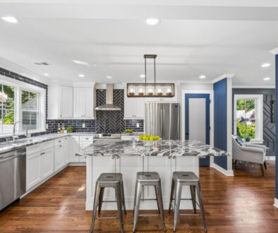 Bright modern kitchen with island, ideal for real estate photography for agents.